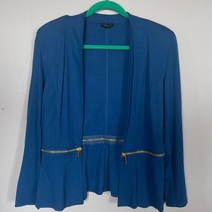 A beautiful navy blue blazer.